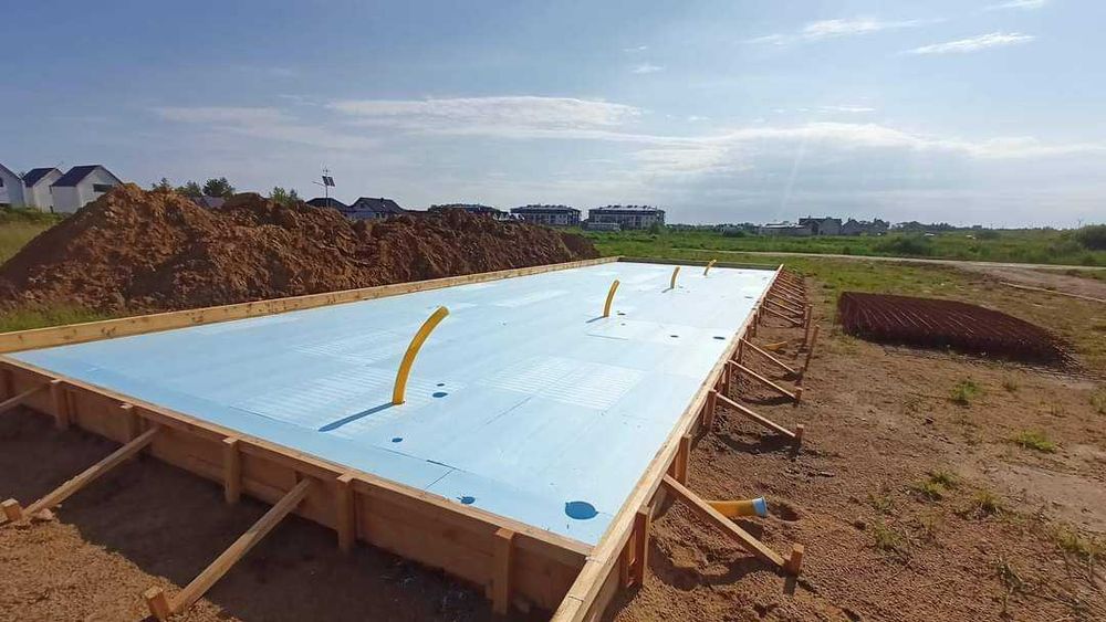 Budowa fundamentów  płyty fundamentowe izolacja ogrodzenia ławy