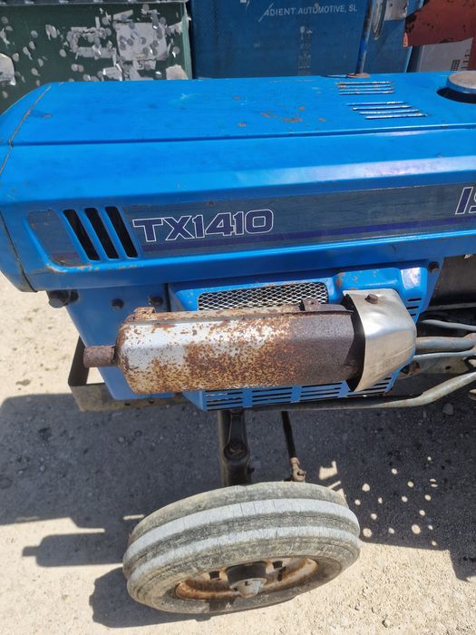 Trator Iseki TX1410 com alfaias