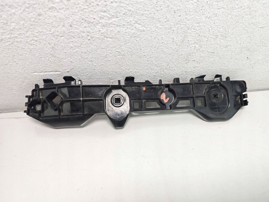 toyota corolla e210 ślizg zderzaka lewy tył 5257602191
