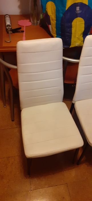 Cadeiras de ferro  e pele