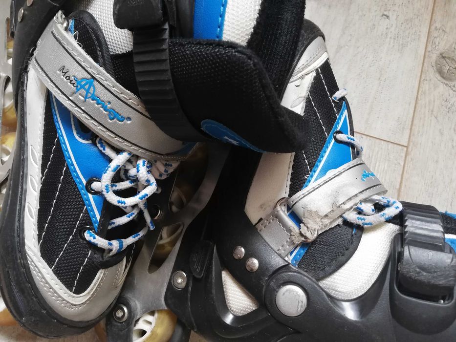 Роликовые коньки