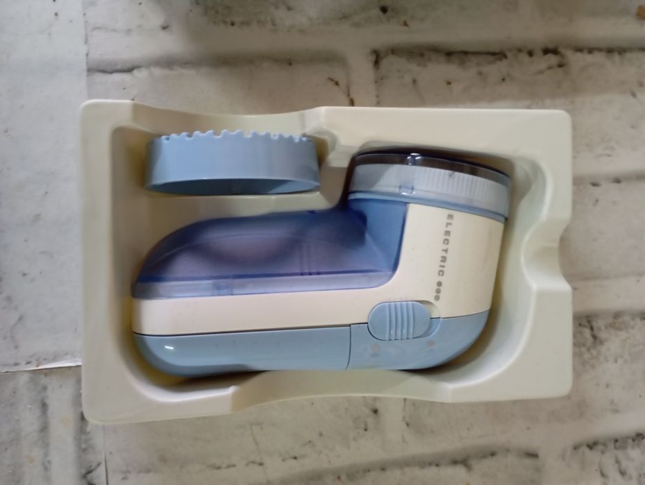 Tira borbotos roupa elétrico NOVO