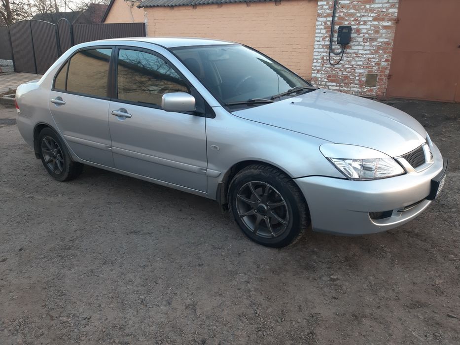 Мітцубісі Ланцер  9 з газом 4.