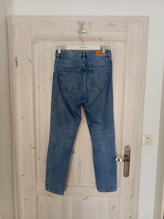 Jeansowe dżinsowe spodnie mom fit niebieskie Monki 36 S