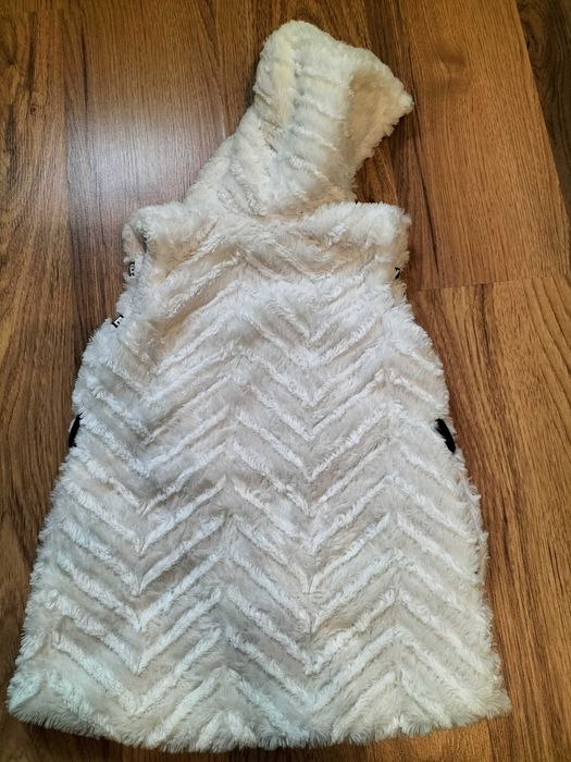 Bezrękawnik dziewczęcy 122/128