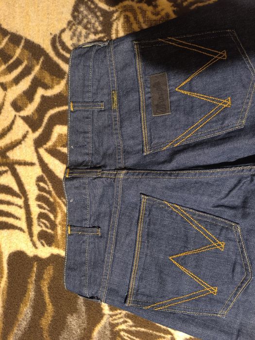 Spodnie męskie jeans Wrangler nowe granatowe W32 L32