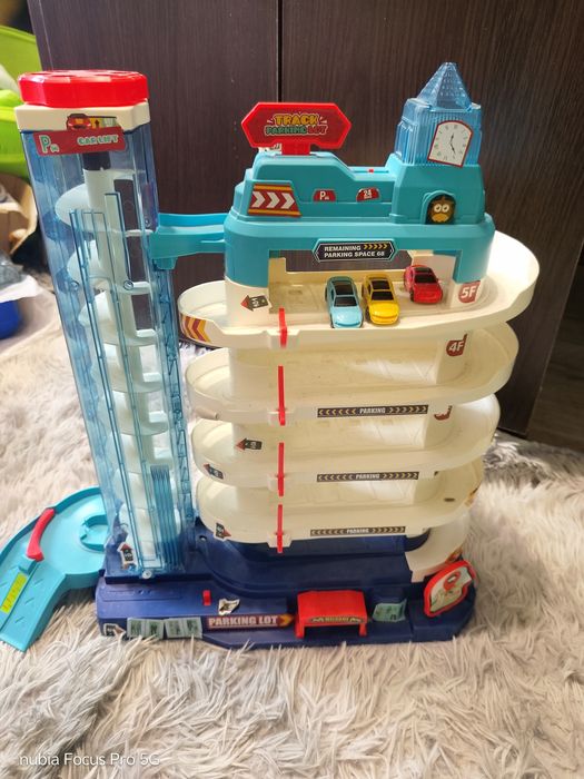 Дитячий музичний гараж-трек-парковка для машинок  з автоматичним ліфто