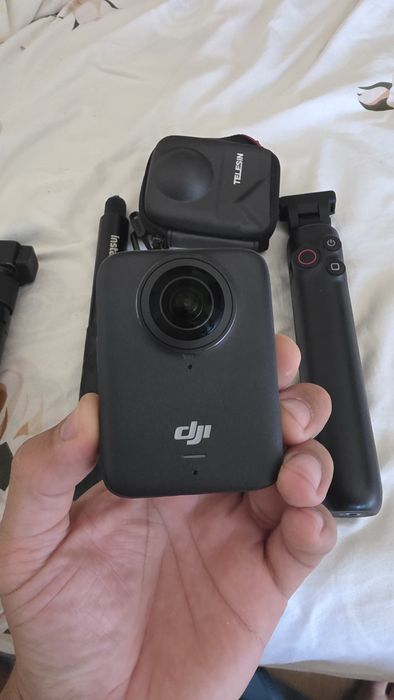 DJI Osmo 360 com Care Refresh e 2 bastões e vários acessórios
