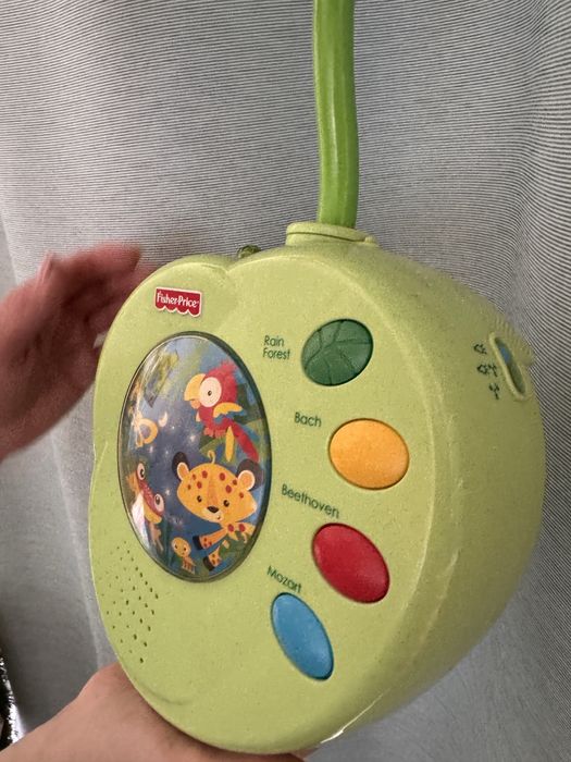 Lampka ,karusela muzyczna na baterie - do zamocowania na łóżeczku