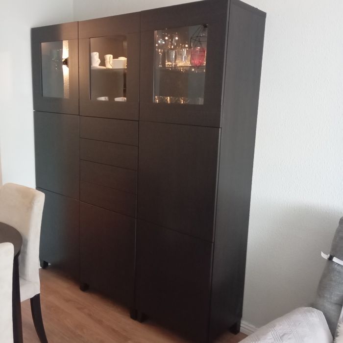 Móvel sala .   3 colunas com 3 portas de vidro, 3  gavetas e 5 portas