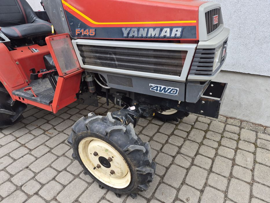 Yanmar z glebogryzarką iseki ładowacz kubota