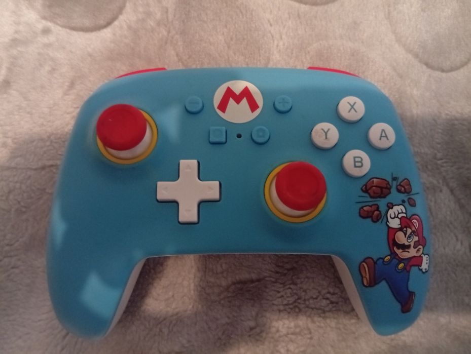 Vendo comado pra nintendo switch do super Mario como pode ver nas foto