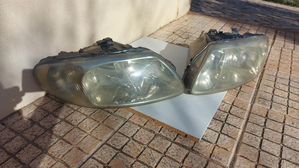 Farol optica dianteira Chrysler Voyager