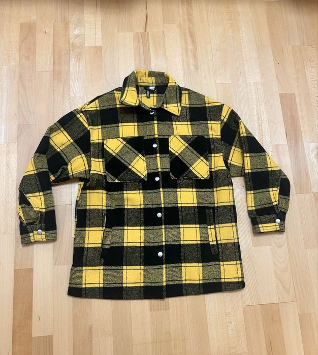 Жіноча кофта-куртка у клітинку