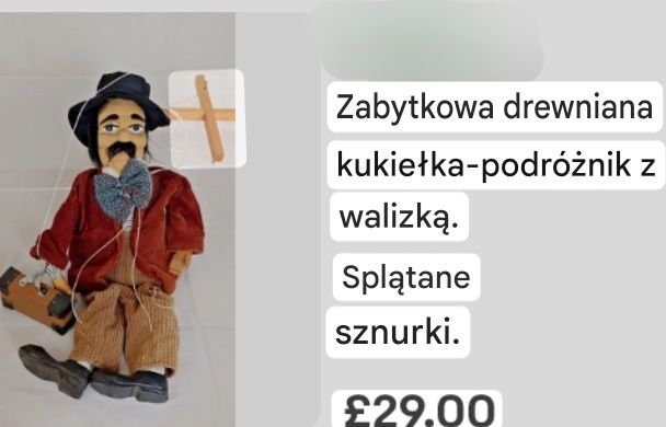 Zabytkowa drewniana kukielka