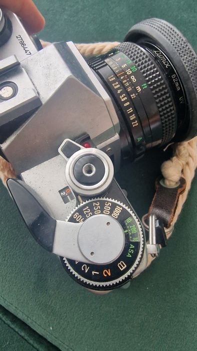 Canon AE-1 + Lente 50mm f/1.8 + Lente 135mm + Flash + Bolsa