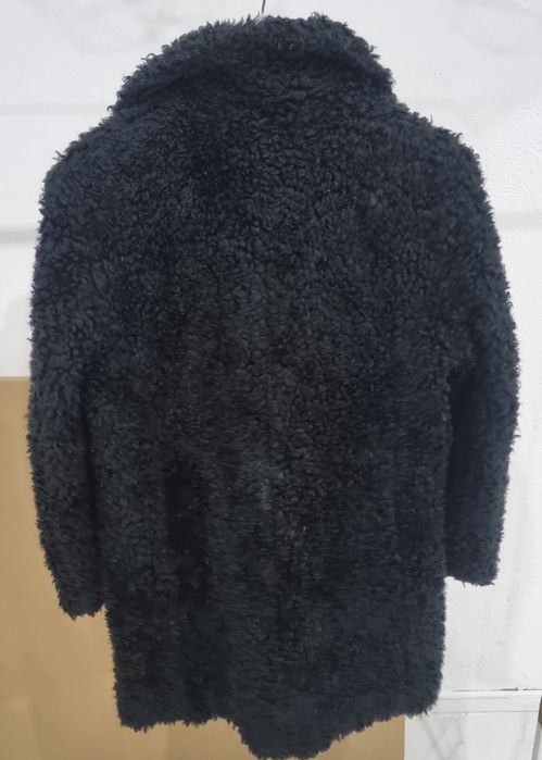 Casaco de Mulher não é novo em bom estado