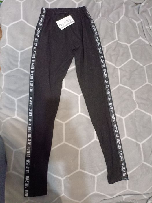 Nowe czarne legginsy 158