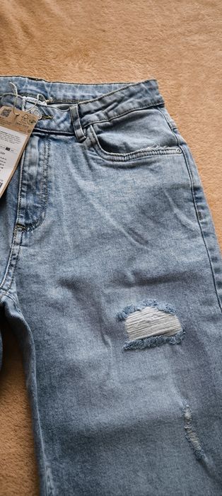 Nowe spodnie jeansowe coccodrillo r. 158