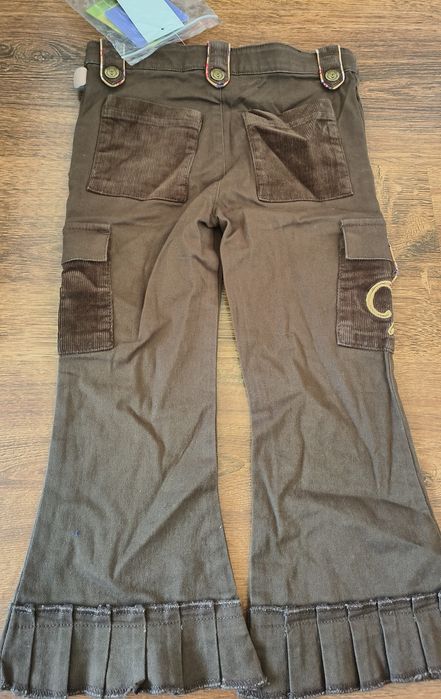 Brązowe jeansy z Kubusiem Puchatkiem