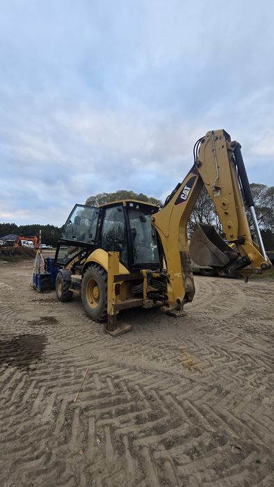 CAT 432F z system automatycznej niwelacji Leveller Salon PL