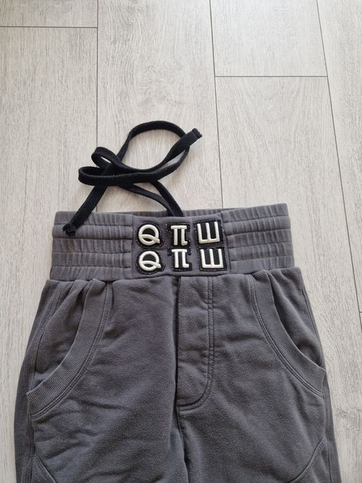 Robert Kupisz spodnie dresy logo