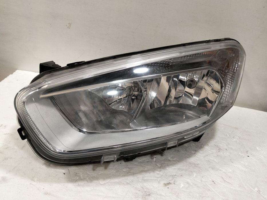 Farol Ford Transit Courier ótica 2015 esquerdo