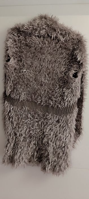 Colete de pelo sem botões . Usado