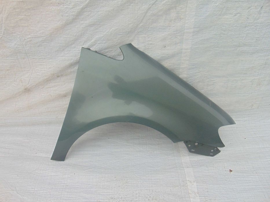 VW TOURAN I Lift BŁOTNIK Prawy Przód Oryginał Części Opolskie 2008