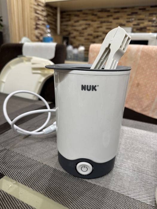 Продам підігрівач Nuk