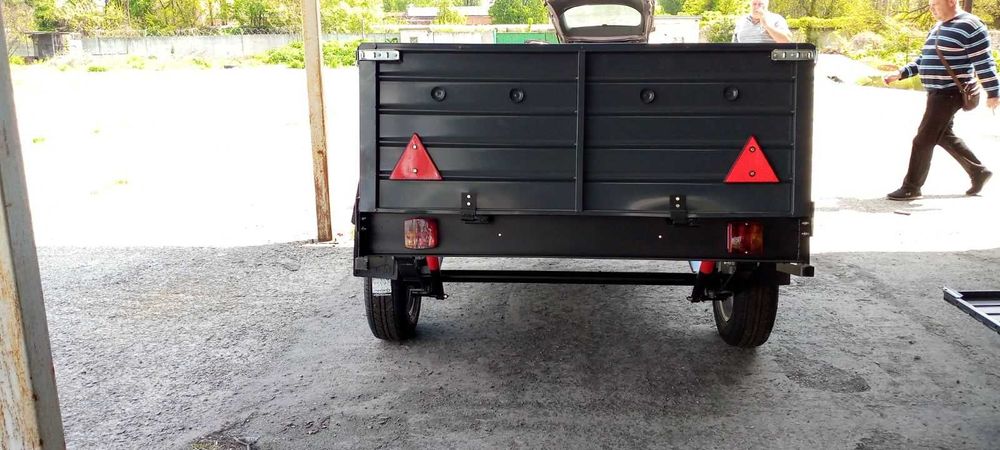 Причіп спеціалізований ПА 23 на ресорах Волга з двома бортами