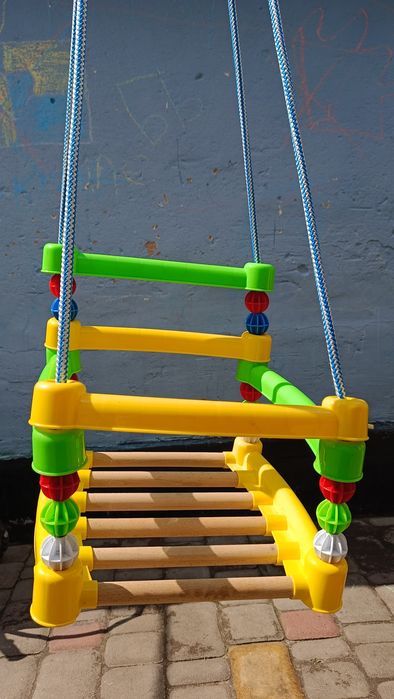 Дитяча гойдалка качеля