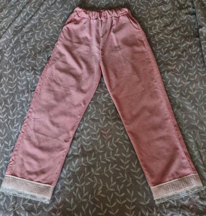 Штани з рюшами рожеві