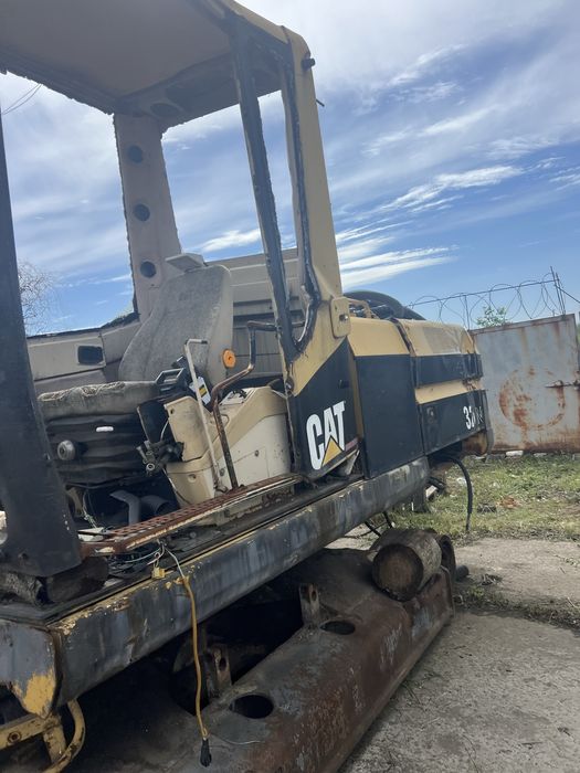 Экскаватор CAT325BL
