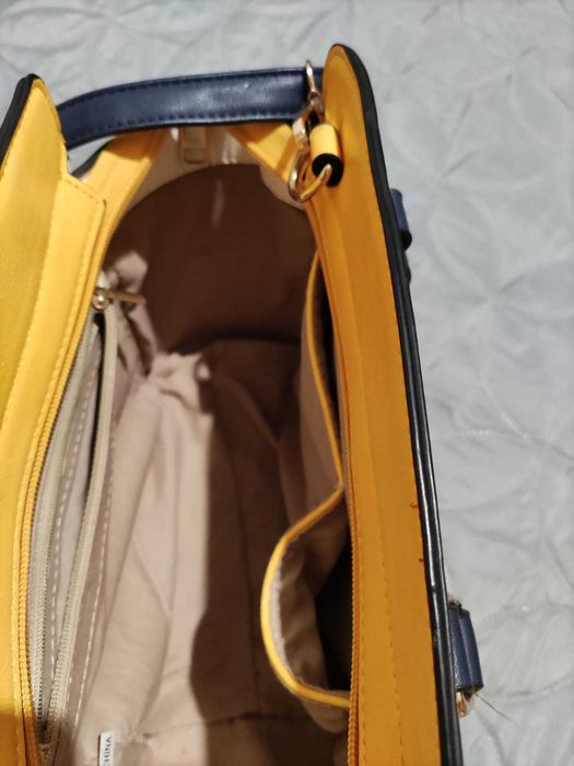 Mala amarela azul e branco