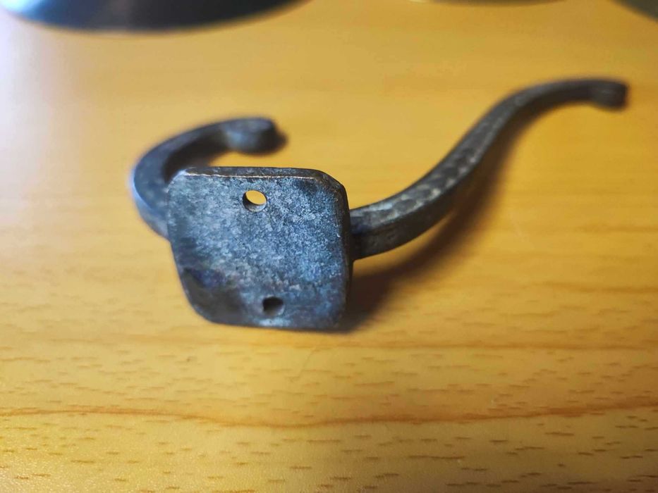 Stary mosiężny wieszak