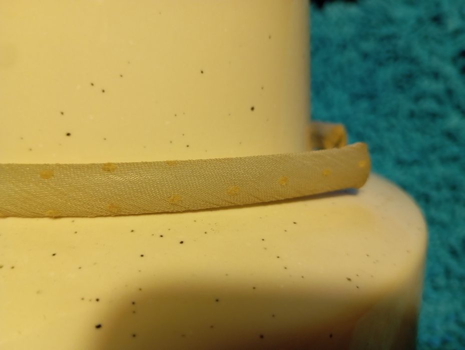 Bandolete fina revestida de tecido