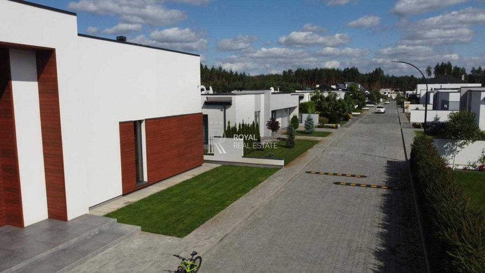 Продаж Будинок Бучанський район КМ «Белгравія» 280 м² 3 спальні Басейн Тераса 100 м² Сауна Джакузі Розумний дім Гараж