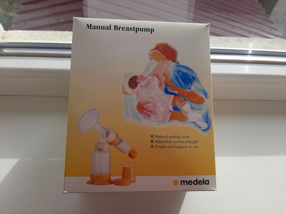 Молокоотсос молоковідсмоктувач ручний medela
