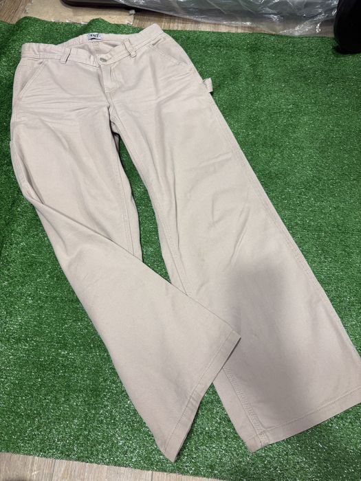 Облягаючі втягуючі кльош штани