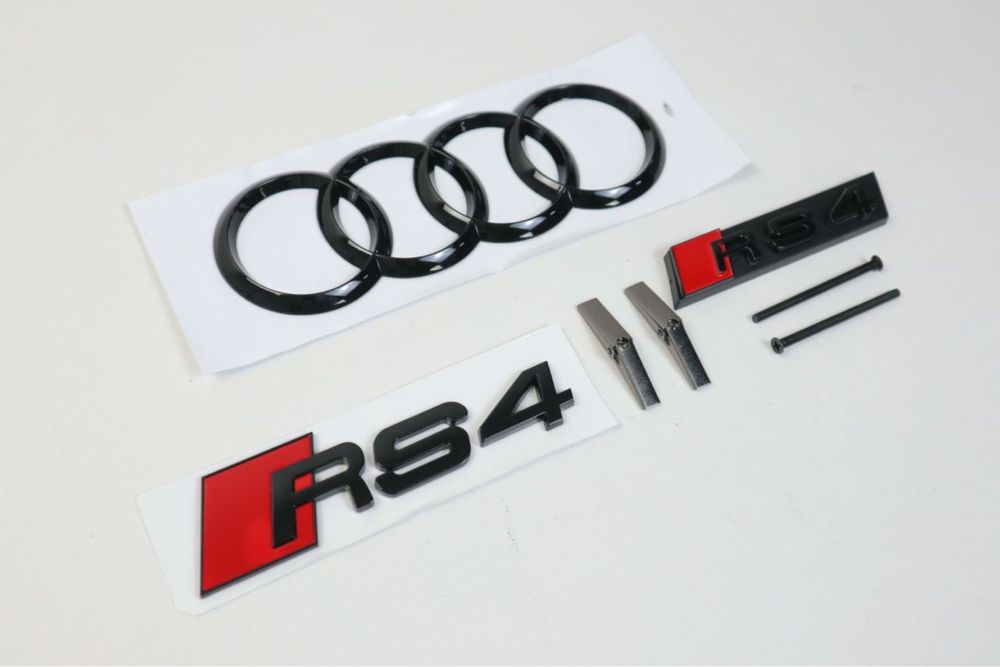 Эмблема шильдик лого кольца в решетку audi a4 rs4 черный глянец