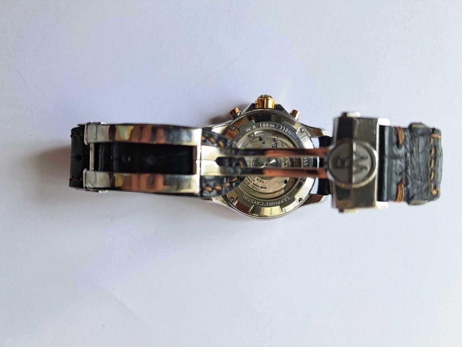 Relogio Raymond Weil em aço e ouro automatic