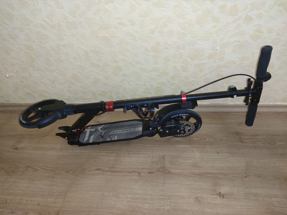Продам самокат двухколесный "Scale Sports", до 100кг, тормоза дисковые