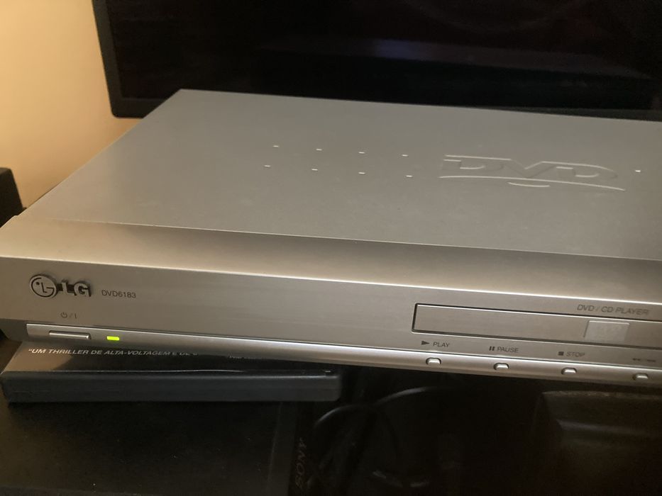 DVD marca LG como novo dentro da caixa
