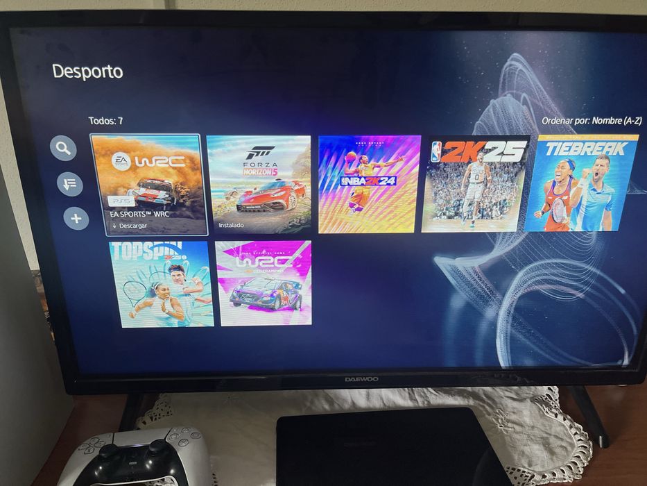 Ps5 dois comandos conta com varios jogos …… tem fifa 26