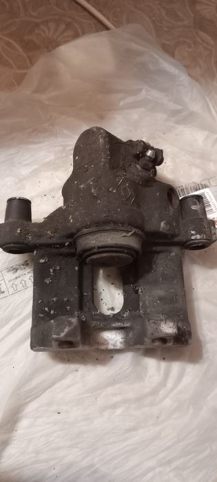 Супорти задні авт. ручника Лагуна 3