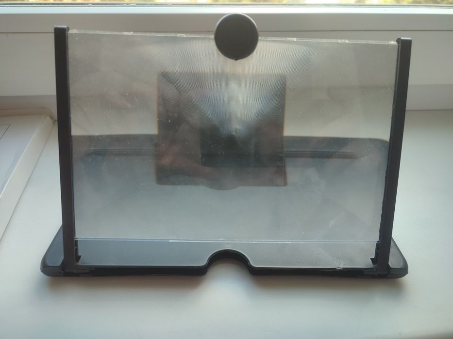 Збільшуване скло для телефону