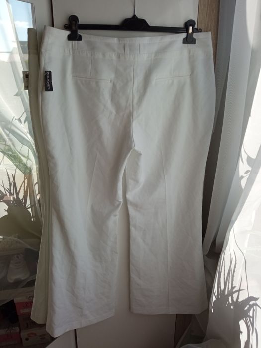 Dunnes nowe spodnie damskie białe proste eleganckie 46