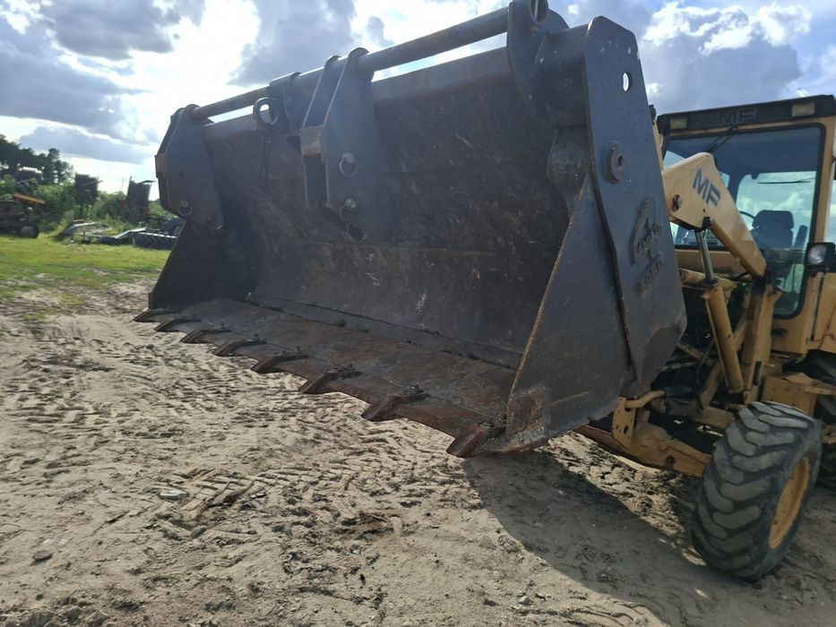 Koparkoladowarka  MF 50HX,  4x4  .