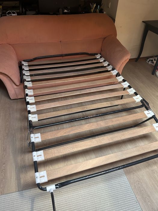 Sofá-cama de 3 lugares em bom estado
